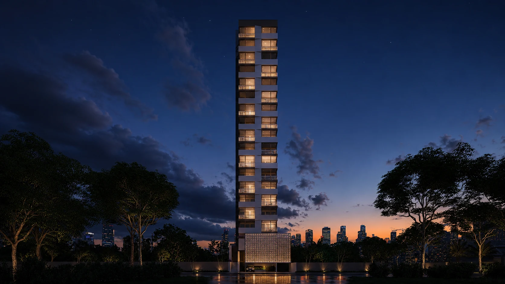 Torre NEXO iluminada ao anoitecer, com o edifício inteiro em destaque.